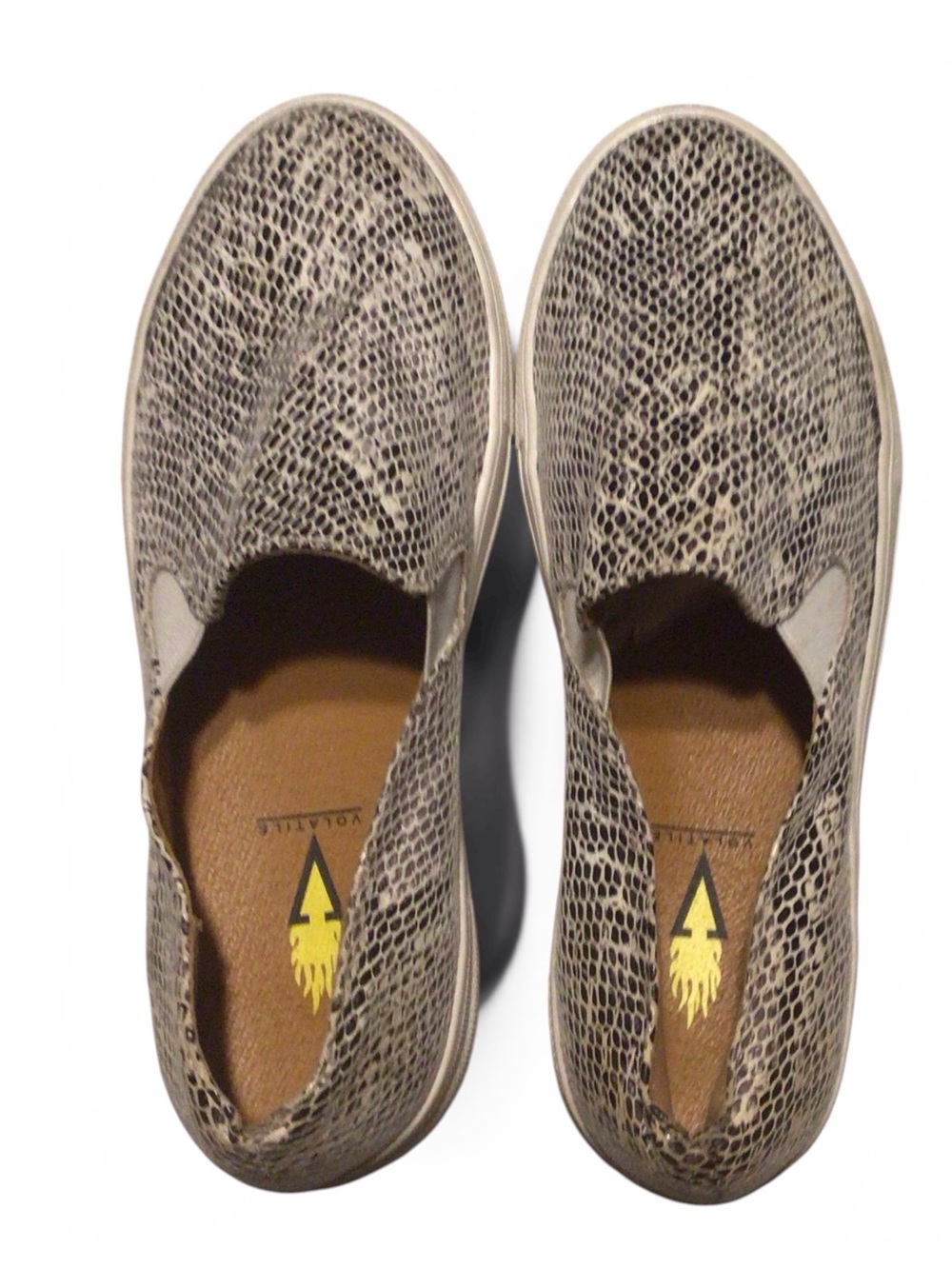 EUC....Womens Volatile slip on snakeskin loafers. Size 7.5